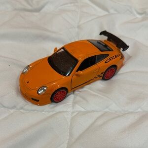 Orange Toy Car with Red Wheels